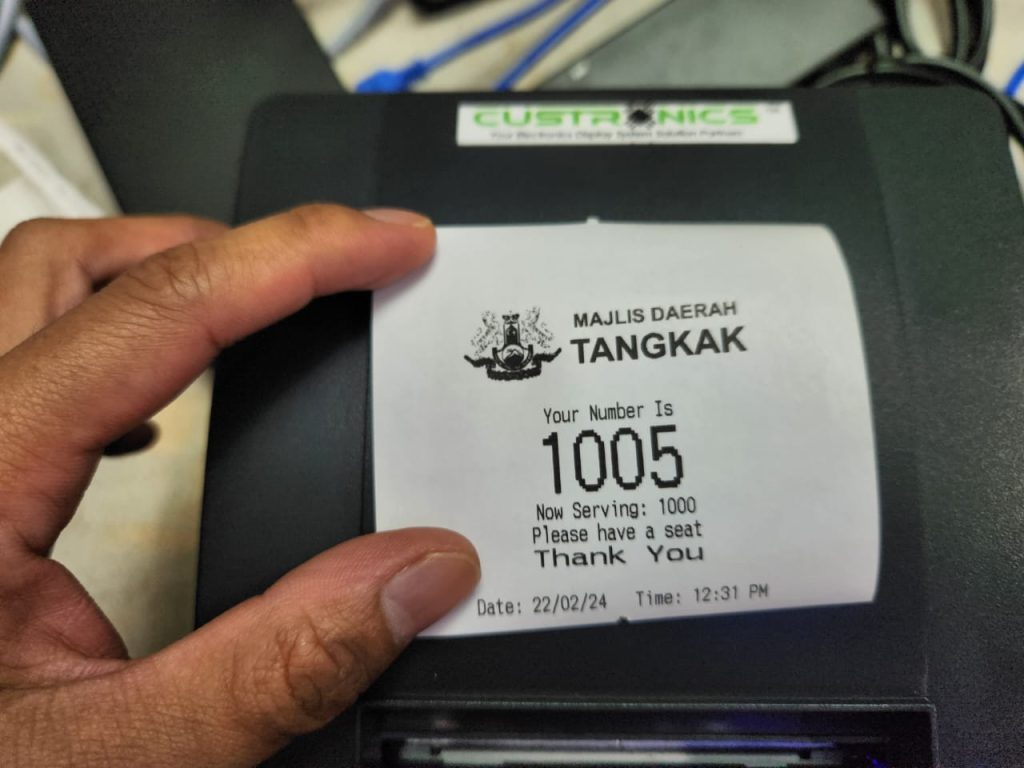 Custronics Queue Management System current service number on receipt